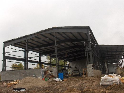 Industrial-Building-Addition_Installation-Of-Roof-Panels-And-Soffit-Insulation-Part5-ColB1-103-Picture-4