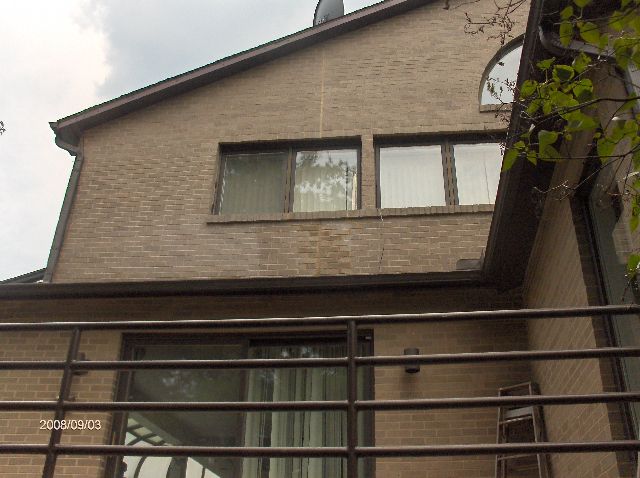 Fixing-Broken-Face-Bricks-In-Existing-House-Part2-In-Southeastern-Michigan-Picture-1