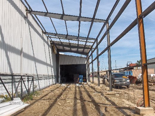 Industrial-Building-Addition_Insatallation-Of-Roof-Panels-And-Soffit-Insulation-ColB1-103-Picture-3